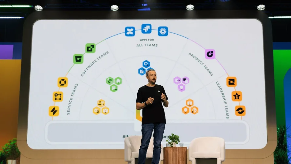 Atlassian founder Mike Cannon-Brookes presenting on stage