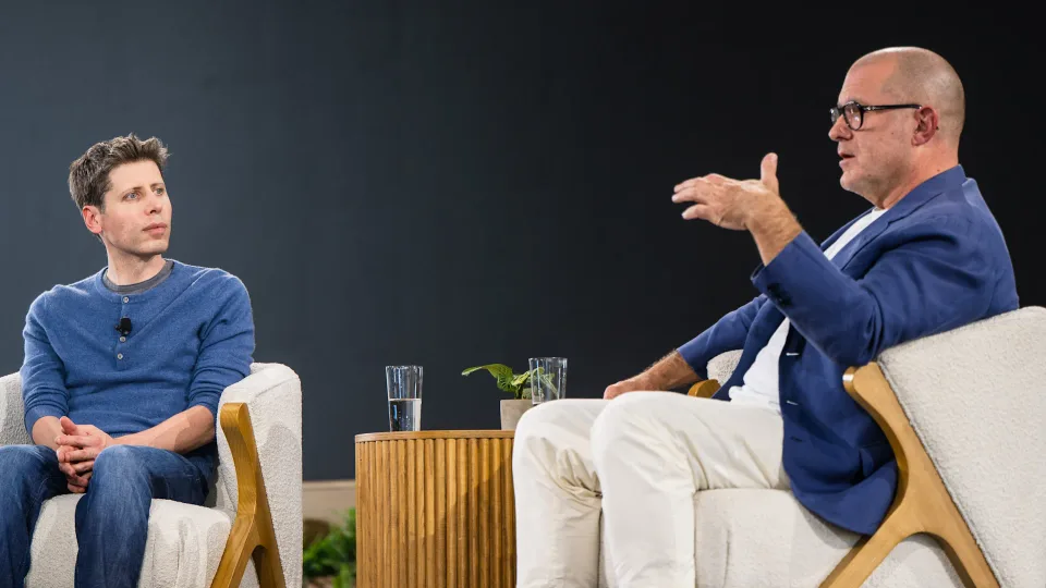Sam Altman and Jony Ive in conversation at OpenAI DevDay